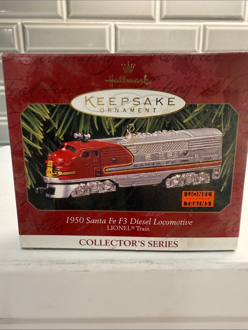 Hallmark Keepsake Ornament Red and Silver Santa Fe F3 Locomotive